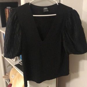 Black short sleeve v neck shirt